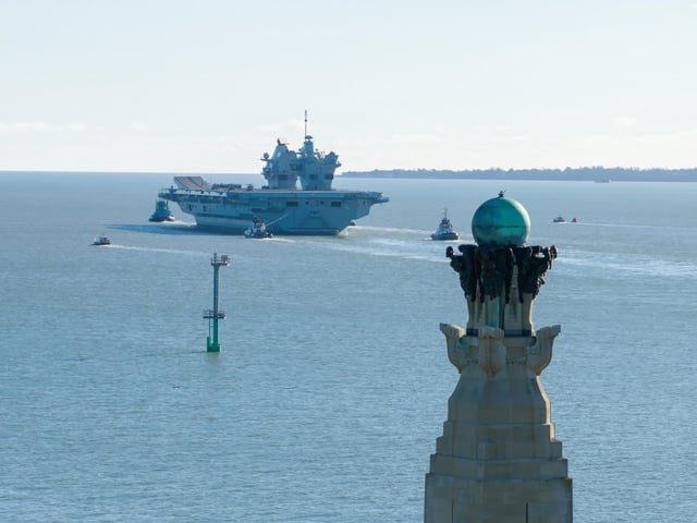 HMS Prince of Wales sailing out of Portsmouth as she heads for a huge Nato deployment in the North Sea. Picture: Michael Woods - Solent Sky Services.