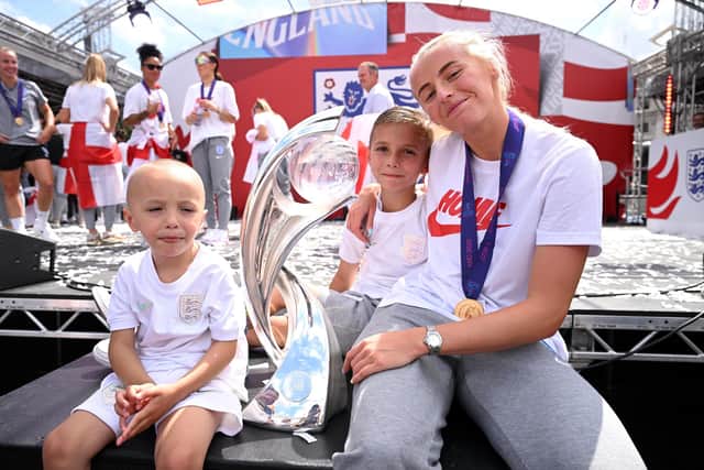 Chloe Kelly celebrates with young fans at the England Women's team celebration in Trafalgar Square. Picture: Leon Neal/Getty Images