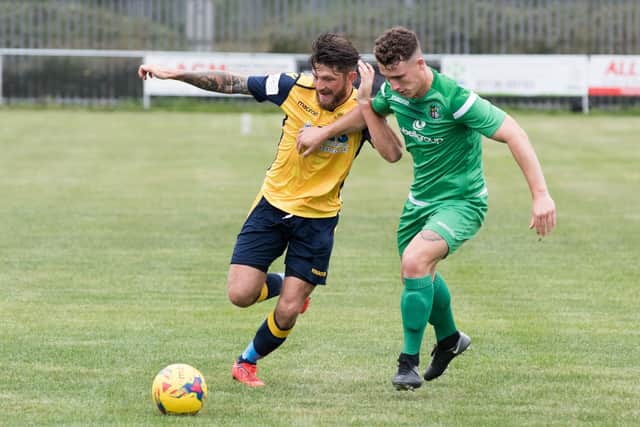 Moneyfields defender Tyler Giddings (left) could make his Horndean debut at AFC Stoneham. Picture: Duncan Shepherd