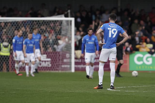 Pompey's players are stunned after Liam Sercombe netted the 76th-minute match winner in Saturday's dismal 1-0 defeat at Cheltenham. Picture: Jason Brown/ProSportsImages