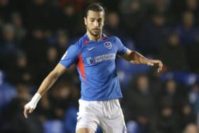 Christian Burgess' booking against Rochdale means he'll serve a two-match suspension. Picture: Robin Jones