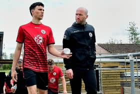 Dave Fuge, right, with Locks player Jaydan William, is looking to win the L4 Teamwear Challenge Cup in his first season back at the club. Picture: Andrew Ormerod.