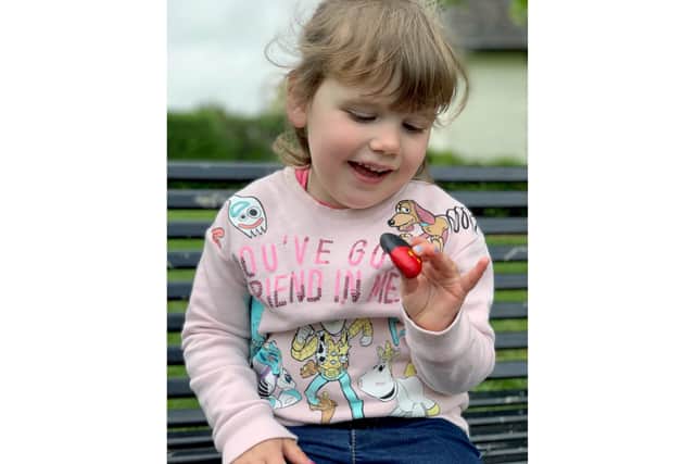 Frankie Cameron and her daughter Grace have been painting rocks to brighten up people's walks around city parks.