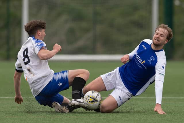 The tackle in which Clanfield captain Will Martin suffered a broken leg in the Hampshire Premier League supplementary cup tie with Denmead at Front Lawn. Picture: Keith Woodland