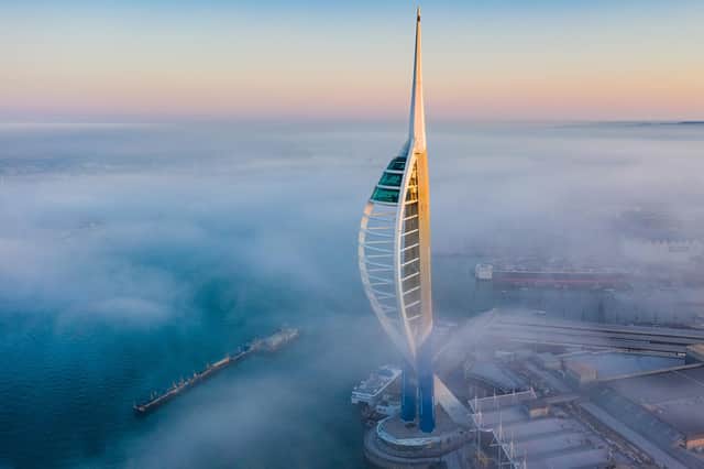 Sea mist swirling around around Portsmouth harbour and Spinnaker Tower. Picture: Brian Bracher, Compass Aerial Photography.