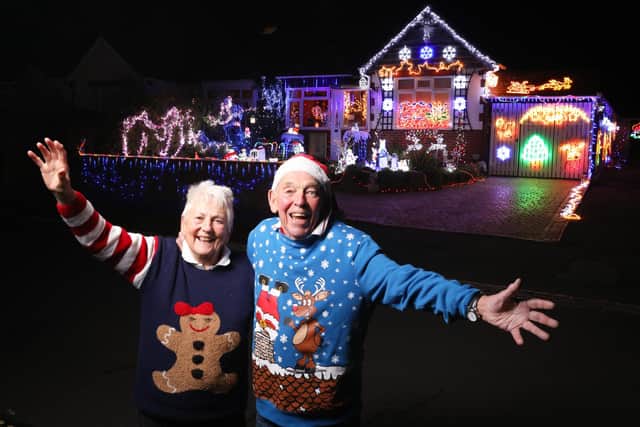 Barbara and Bill Wright have decorated their house in Portchester with Christmas lights, for charity
Picture: Chris Moorhouse   (jpns 291121-27)