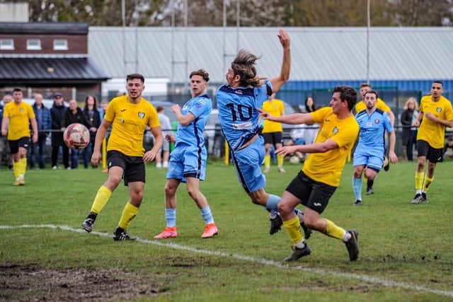 Scott Jones scores Portchester's late equaliser at Hamble. Picture by Daniel Haswell