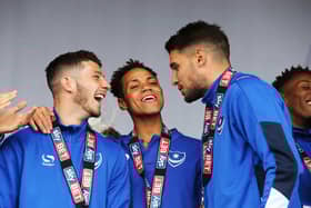 Conor Chaplin and Gareth Evans are autographing copies of Pompey: The Island City With A Football Club For A Heart - the forthcoming book they both appear in. Picture: Joe Pepler