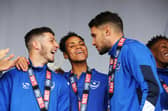 Conor Chaplin and Gareth Evans are autographing copies of Pompey: The Island City With A Football Club For A Heart - the forthcoming book they both appear in. Picture: Joe Pepler