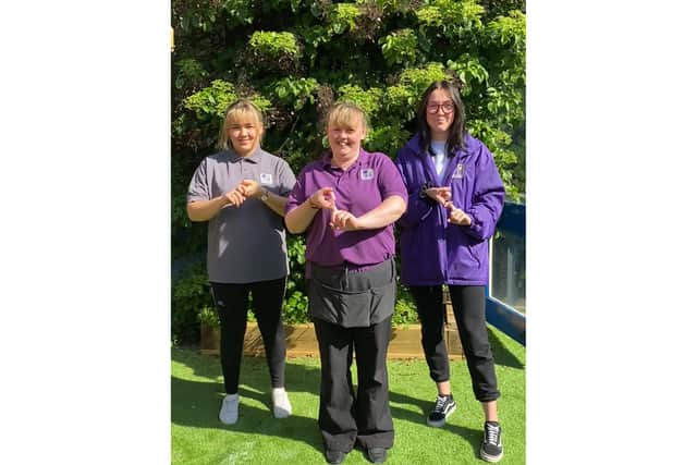 Growing Places childcare providers created a video of staff singing and signing to Lean on Me by Bill Withers.Pictured is: (left to right) Annie Wheeler, Stacey Simmonds and Tia Fletcher.