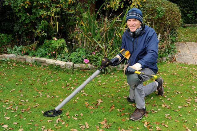 Mark Williams, 71, with the metal detector he used to discover the medal.

Picture: Sarah Standing