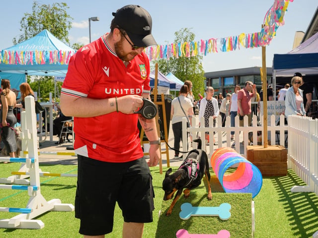 Jack Roberts takes his dog Tina through the course.Picture: Keith Woodland (250521-55)