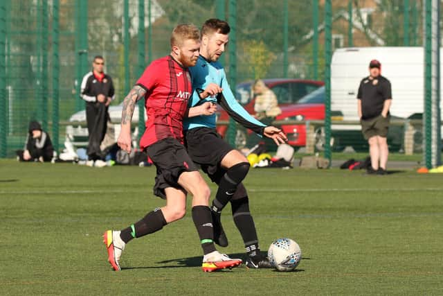 Burrfields (blue) v Horndean United. Picture by Kevin Shipp