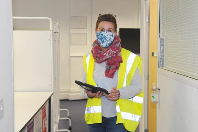 Volunteer Gaby Funke-Martin, 46, at Lalys Pharmacy in Guildhall Walk, Portsmouth. Picture: Sarah Standing (220421-7035)