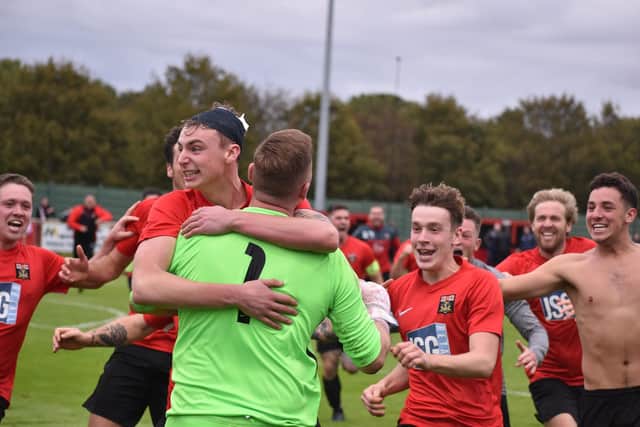 Fareham celebrate their FA Vase penalty shoot-out win against Jersey Bulls. Picture: Paul Proctor