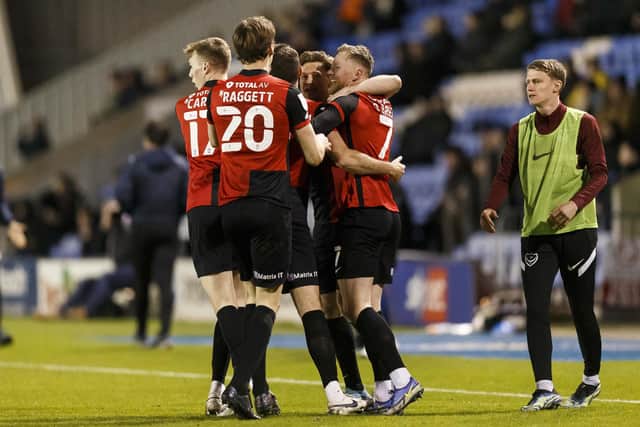 Aiden O'Brien celebrates with his Pompey team-mates after levelling in the 29th minute against Shrewsbury. Picture: Daniel Chesterton/phcimages.com