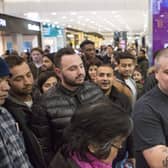 Shoppers wait outside the entrance to leading games retailer GAME in Westfield shopping centre in Stratford ahead of a  Black Friday event. 
Picture: Rick Findler/PA Wire