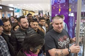 Shoppers wait outside the entrance to leading games retailer GAME in Westfield shopping centre in Stratford ahead of a  Black Friday event. 
Picture: Rick Findler/PA Wire