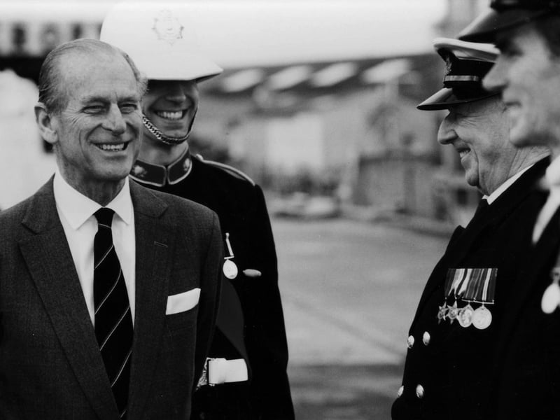 Mr Archie Weston of the Royal Naval Volunteer Band of HMS Collingwood shares a joke with Prince Philip the Duke of Edinburgh on the 3rd December 1993.