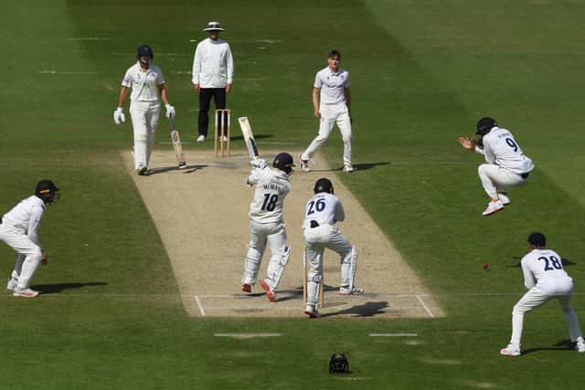 Delray Rawlins of Sussex takes evasive action as Lewis McManus hits out at Hove. Photo by Mike Hewitt/Getty Images.