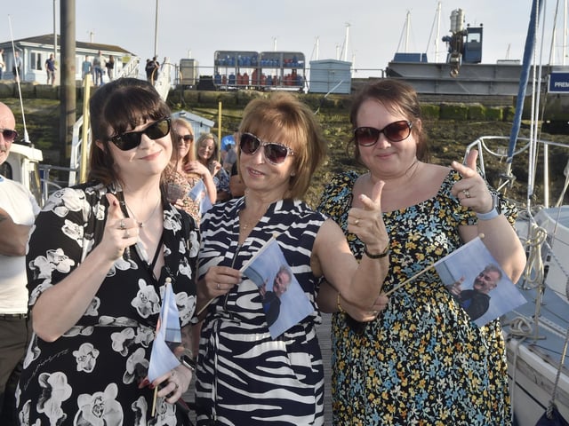 Craftsman Michael Savage, known as Mick, died on April 1 this year. His body was recovered off the coast of Dover after he set off from Southsea. On Friday, May 10, 2024 Mick's boat Konsorted was bought back to Southsea Marina. Pictured is: (l-r) Friends Charlie-Ann Wileman, Janice Millis and Charlotte Milner.Picture: Sarah Standing (100524-2332)