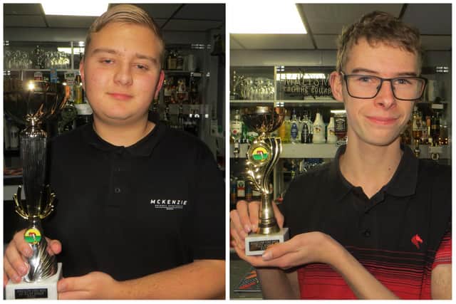 Samuel Laxton, left, and Daniel Walter with their Cuestars trophies