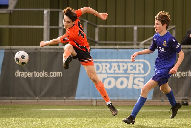 Action from the Portsmouth Youth League Stuart Madigan Cup final between Baffins Milton Rovers Vipers U14s (all blue kit) and AFC Portchester Vikings U14s (orange and black kit). Picture: Keith Woodland (190321-859)