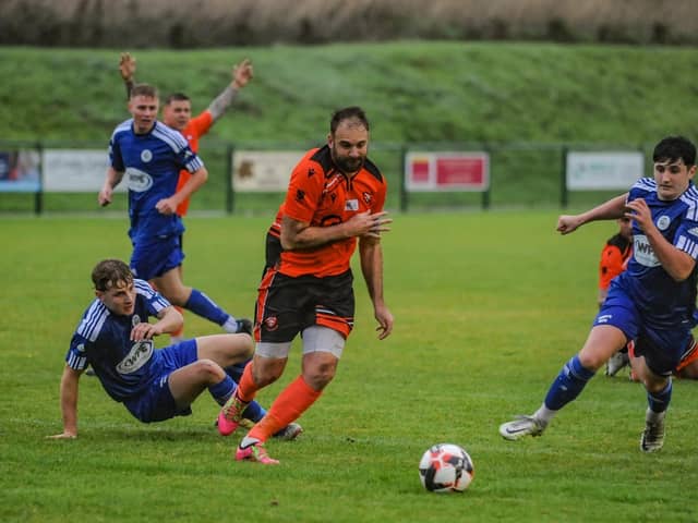 Hat-trick hero Brett Pitman in action for AFC Portchester during the 3-2 win at Portland that took them back into top place in the Wessex League. Picture by Daniel Haswell