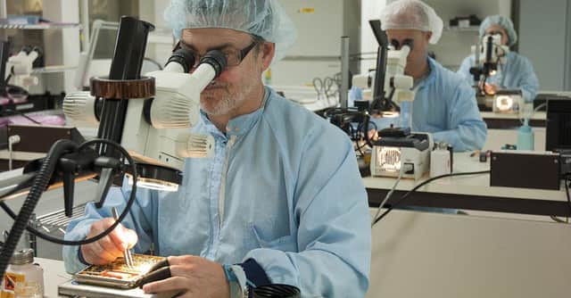 Specialists at BAE Systems work on complex electronics at Broad Oak's 'clean room'. Photo: BAE Systems