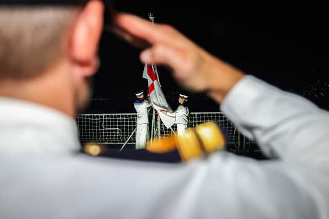 Pictured: Ceremonial Sunset on board HMS Spey.