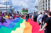Supporters lined the Esplanade to greet the parade on its way to Southsea Common. Picture:Marcin Jedrysiak