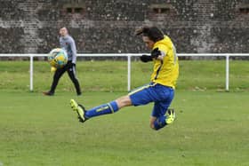 Franco Tossi scores one of his two goals for Meon Milton against Rowner. Picture: Kevin Shipp