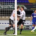 Sean Raggett celebrates his winning goal for Pompey against Ipswich in the FA Cup first round. Picture: Nigel Keene