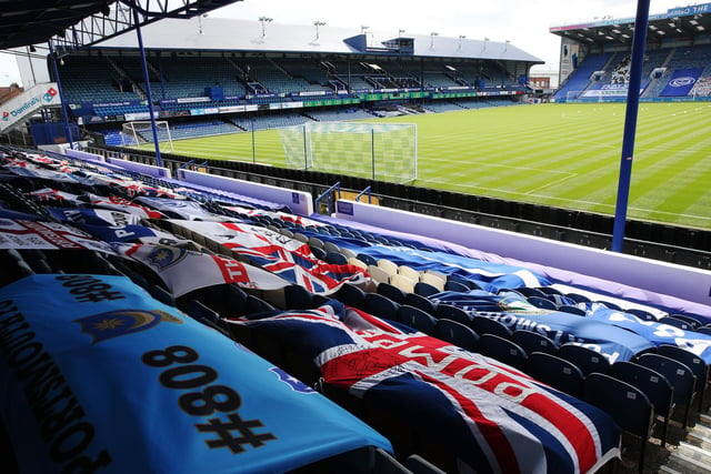 Flags take centre stage in the stands at Fratton Park