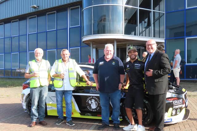 Left to right: Dave Travers, Cliff Walker, Andy Burdon, Nic Hamilton, Grahame Morris. Powder Monkey Brewing Co logo.