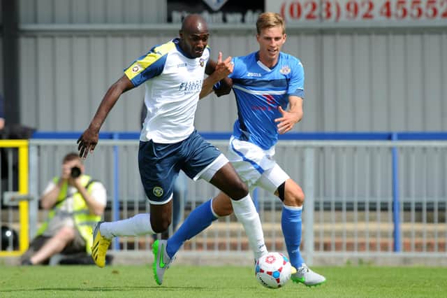 Marvin Morgan, left, in action for Hawks in a pre-season friendly against Eastleigh. Picture: Allan Hutchings