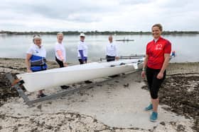 Dr Sophie Bostock, in red, is training to row around the UK in June in aid of the British Heart Foundation. She is pictured along with, from left, Julia Rooke, Andi Davies, Dee Pullen and Andrew Ferrand, at Dolphin Rowing Club, Northney Marina. Picture: Chris Moorhouse (jpns 140521-10)