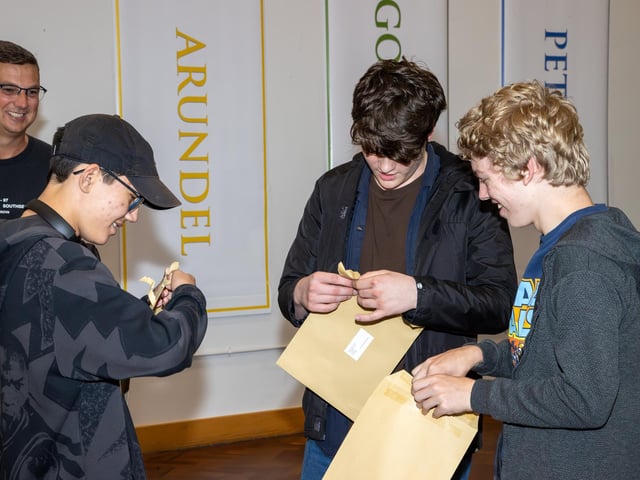 Students were welcomed to Crookhorn College to collect their GCSE results.Pictured - Students opening their GCSE resultsPhotos by Alex Shute