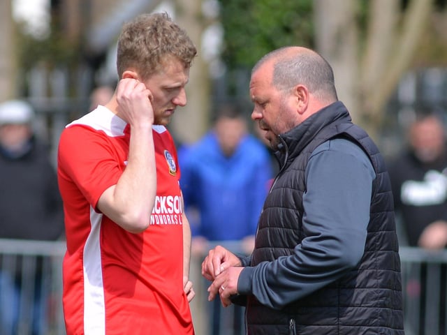 Horndean boss Michael Birmingham speaks to his caption Ash Howes. Picture by Martyn White
