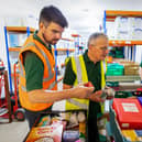Volunteers packing emergency food parcels