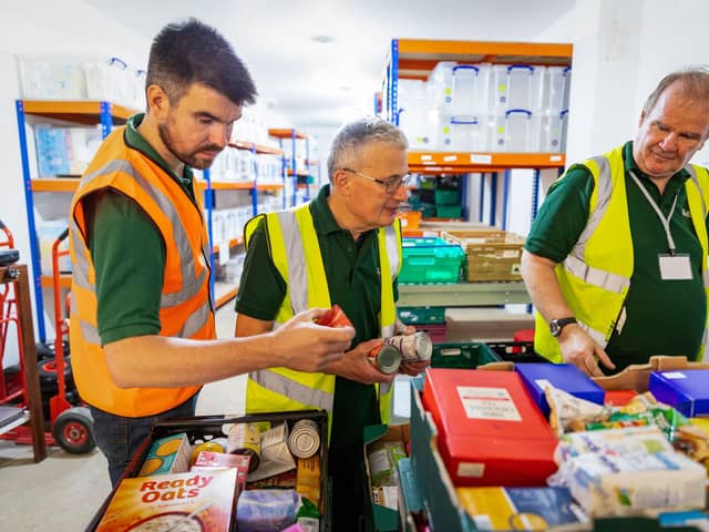 Volunteers packing emergency food parcels