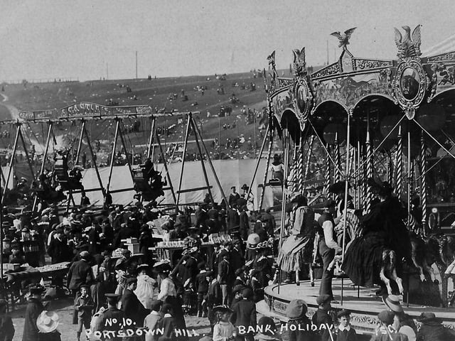 The fair that was held on Portsdown Hill, with a packed carousel and boat swings.