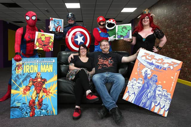 Cosplayers, from left, James Price as Spiderman, Gary Curtis as Captain America, Tomas Deane as Mario, and Leah Blake as Bowsette, with co-owners Max Cooke and Beth Davis both sitting on the sofa. Picture: Chris Moorhouse (jpns 220621-01)
