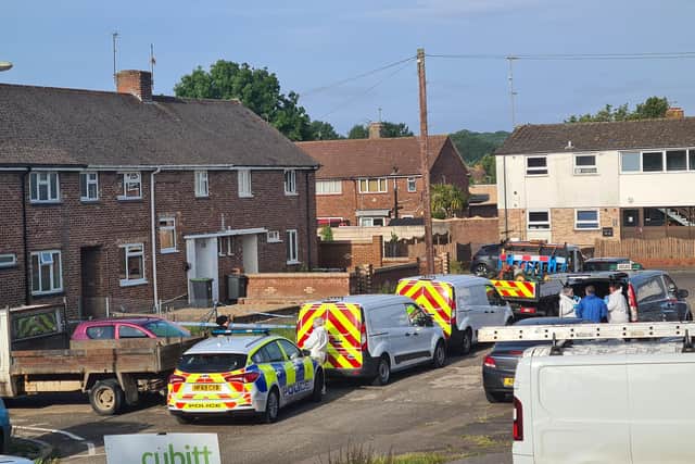 The scene on Tichborne Grove this morning.