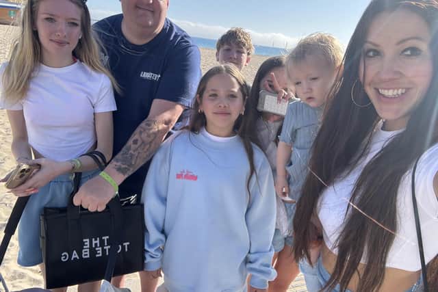 Sophie Mei Lan and Danny Malin in Benidorm with their kids