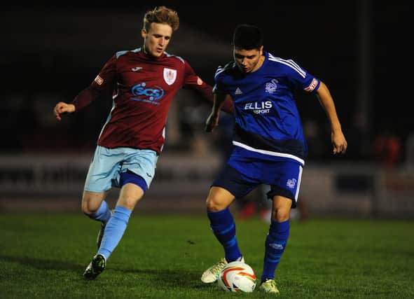 Craig Veal, in action for Taunton Town in a Southern League game (left), is one of many Plymouth Parkway goal threats Fareham will have to deal with in the FA Vase third round tie this weekend. Photo by Harry Trump/Getty Images.