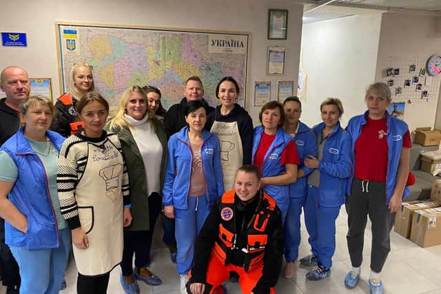 ‘Esculab’ in Ukraine - a group of volunteers who are producing ration packs and dried foods for soldiers on the front line. In this picture Maria and Kamila from the medical Polish NGO ‘ZSR’ and myself Matt Simmons from Bridge to Unity, BTU volunteers - Hannah Jarvis and Liberty Rose. The others in blue are the Ukrainian volunteers for Esculab.