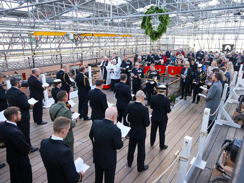 Pictured: Guests during the ceremony on HMS Victory.