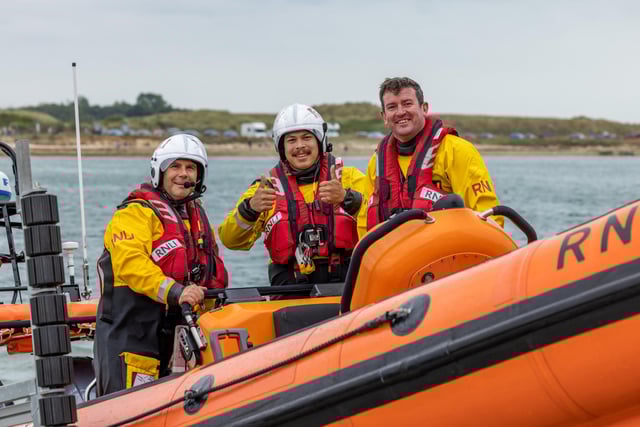RNLI crew during the open day at Langstone Harbour. Picture: Mike Cooter (310824)