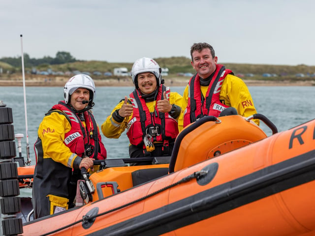 RNLI crew during the open day at Langstone Harbour. Picture: Mike Cooter (310824)